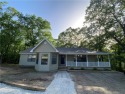 This beautifully remodeled 3BR/2BA home sits on 2 wooded lots( for sale in Holiday Island Arkansas Carroll County County on GolfHomes.com