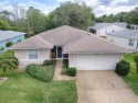 Beautiful 3 BDRM / 2 BTH home is a MUST-SEE!!! Gorgeous flooring for sale in Leesburg Florida Lake County County on GolfHomes.com