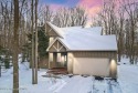 Welcome to this charming mountain home nestled within Pinecrest for sale in Pocono Pines Pennsylvania Monroe County County on GolfHomes.com