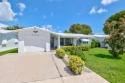This beautifully kept 2 / 2 home is one of the largest models for sale in Pompano Beach Florida Broward County County on GolfHomes.com