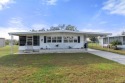 Charming 2-Bedroom, 2-Bath Manufactured Home with Prime Golf for sale in Brooksville Florida Hernando County County on GolfHomes.com