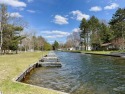 This home comes with shared, deeded frontage with private dock for sale in Saint Helen Michigan Roscommon County County on GolfHomes.com