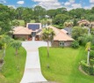 Welcome to your completely custom waterfront pool home in the for sale in Daytona Beach Florida Volusia County County on GolfHomes.com