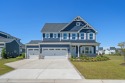 Welcome to this stunning 2023-built Lehigh model by Ryan Homes for sale in Longs South Carolina Horry County County on GolfHomes.com
