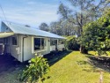 Situated outside the charming Volcano Village in the desirable for sale in Volcano Hawaii Big Island County County on GolfHomes.com