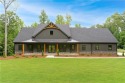 Welcome to this stunning Craftsman home nestled on a beautiful for sale in Forsyth Georgia Monroe County County on GolfHomes.com