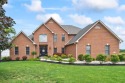 Make this all-brick executive Foxfire estate your home and you for sale in Commercial Point Ohio Pickaway County County on GolfHomes.com