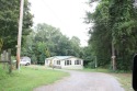 Manufactured home on 3 acres off Hwy 70, SECLUDED, quiet for sale in Sparta Tennessee DeKalb County County on GolfHomes.com