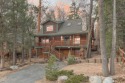 Experience the epitome of mountain living in this charming for sale in Big Bear Lake California San Bernardino County County on GolfHomes.com