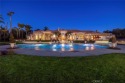 A luxurious single-level museum-inspired home in the private for sale in Rancho Santa Fe California San Diego County County on GolfHomes.com