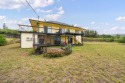 Beautiful and Meticulously maintained 3/2 with sweeping ocean for sale in Naalehu Hawaii Big Island County County on GolfHomes.com