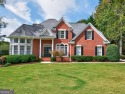 Welcome to this exceptional 3-sides brick, 6 BEDROOMS, 5 BATH for sale in Suwanee Georgia Forsyth County County on GolfHomes.com