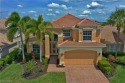 TERRIFIC VIEWS OF 10TH HOLE ACROSS WIDE LAKE!  This 2,444SF for sale in Fort Myers Florida Lee County County on GolfHomes.com
