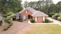 This turnkey Maple Ridge gem expertly balances timeless charm for sale in Columbus Georgia Muscogee County County on GolfHomes.com