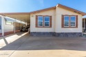 THIS HOME IS IN VERY GOOD CONDITION..  THERE IS. PARKING fOR 1 for sale in Surprise Arizona Maricopa County County on GolfHomes.com