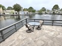 Featuring an enviable position on a tranquil lake and across for sale in Miramar Beach Florida Walton County County on GolfHomes.com
