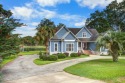 This custom Southern Living-style home sits on a tranquil pond for sale in Santee South Carolina Orangeburg County County on GolfHomes.com