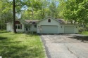 Welcome to this cozy 3-bedroom 2-bath home in Canadian Lakes for sale in Stanwood Michigan Mecosta County County on GolfHomes.com