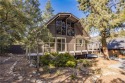 Welcome to 2117 Bernina Drive, a charming mountain home nestled for sale in Pine Mountain Club California Kern County County on GolfHomes.com