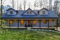 Tucked away in the serene North Georgia mountains, this for sale in Ellijay Georgia Gilmer County County on GolfHomes.com