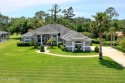BUILT BY CUSTOM HOME BUILDER CHARLES RENICK in 2004, this for sale in Ormond Beach Florida Volusia County County on GolfHomes.com