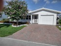 Welcome to this completely remodeled 3-bed, 2-bath home in a 55+ for sale in Boynton Beach Florida Palm Beach County County on GolfHomes.com