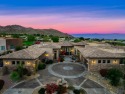 Perched overlooking the 9th hole of the Mountains Course behind for sale in Palm Desert California Riverside County County on GolfHomes.com