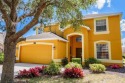 Welcome to this FULLY FURNISHED 5-bedroom, 4.5-bathroom home in for sale in Davenport Florida Polk County County on GolfHomes.com