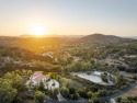 Introducing an extraordinary gated estate offering privacy and for sale in Poway California San Diego County County on GolfHomes.com