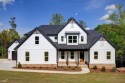 Enjoy all the perks of this modern farmhouse plan located in for sale in Newnan Georgia Coweta County County on GolfHomes.com
