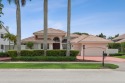 Experience luxury living in this exquisite 3,105 sq ft residence for sale in Boca Raton Florida Palm Beach County County on GolfHomes.com