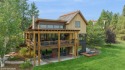 Step into the captivating world of Wilderness Club living! This for sale in Eureka Montana Lincoln County County on GolfHomes.com