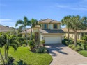 Located in the gated resort-style community of Verandah, this for sale in Fort Myers Florida Lee County County on GolfHomes.com