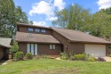This mid-century modern home has been tastefully updated while for sale in Canton Mississippi Madison County County on GolfHomes.com