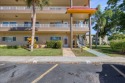 Welcome home to this first floor, end unit! Pull right up, walk for sale in Clearwater Florida Pinellas County County on GolfHomes.com