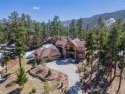Stunning custom home in Perry Park! This house is carefully for sale in Larkspur Colorado Douglas County County on GolfHomes.com