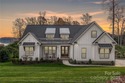 Discover refined lakeside living in this custom home completed for sale in Mooresville North Carolina Iredell County County on GolfHomes.com