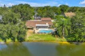Where golf community living meets lakeside retreat... all just a for sale in Seminole Florida Pinellas County County on GolfHomes.com
