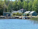 Imagine owning your very own waterfront resort on the renowned for sale in Drummond Island Michigan Chippewa County County on GolfHomes.com