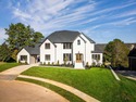 Experience luxury living at its finest in this stunning for sale in Ooltewah Tennessee Hamilton County County on GolfHomes.com