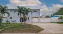 Beautiful 4 bed 3 bath home built to Miami Dade code certified for sale in Largo Florida Pinellas County County on GolfHomes.com