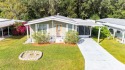 Welcome to your new oasis in the heart of the desirable Betmar for sale in Zephyrhills Florida Pasco County County on GolfHomes.com