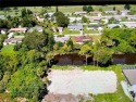 PERMIT READY! PRECONSTRUCTINAL SITE! CANAL FRONT! READY TO BE for sale in Port Charlotte Florida Charlotte County County on GolfHomes.com