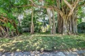 A beautifully treed vacant lot, 135 X 87.50, ready to build and for sale in Lake Worth Florida Palm Beach County County on GolfHomes.com