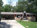 This charming 2 bedroom 1 1/2 bath is nestled among large shade for sale in Horseshoe Bend Arkansas Izard County County on GolfHomes.com