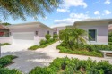 Exceptional Loxahatchee Club lake and golf course views can be for sale in Jupiter Florida Palm Beach County County on GolfHomes.com