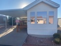 This 2001 Park Model has been well cared for and includes a Golf for sale in Arizona City Arizona Pinal County County on GolfHomes.com