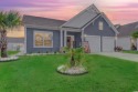 Better Than New! This lovely craftsman-style home features three for sale in Murrells Inlet South Carolina Horry County County on GolfHomes.com