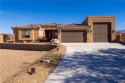 Discover this stunning, custom-built 4-bedroom home with an RV for sale in Lake Havasu Arizona Mohave County County on GolfHomes.com