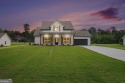 This modern farmhouse ranch-style home is situated right on the for sale in Griffin Georgia Spalding County County on GolfHomes.com